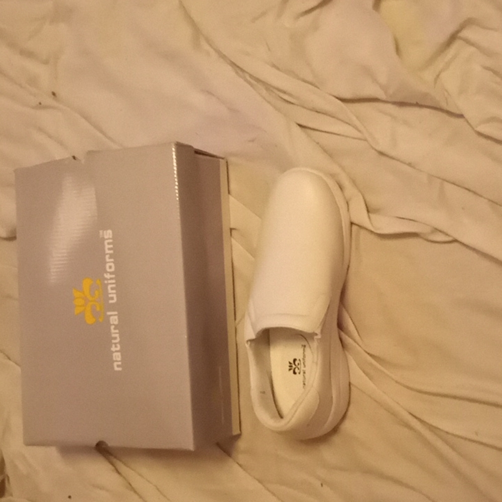Natural uniforms brand white nurses shoes. New, never worn.  Size 11W